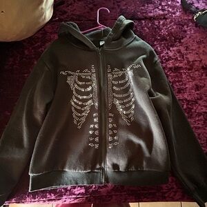 It’s a pretty nice sweater I like it, but I got another one. That is my size